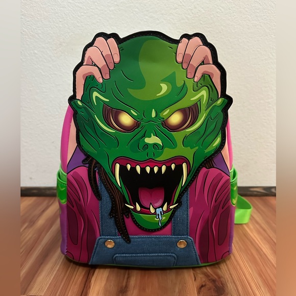 Loungefly Handbags - NWT Loungefly Goosebumps Haunted Mask Glow in the dark backpack